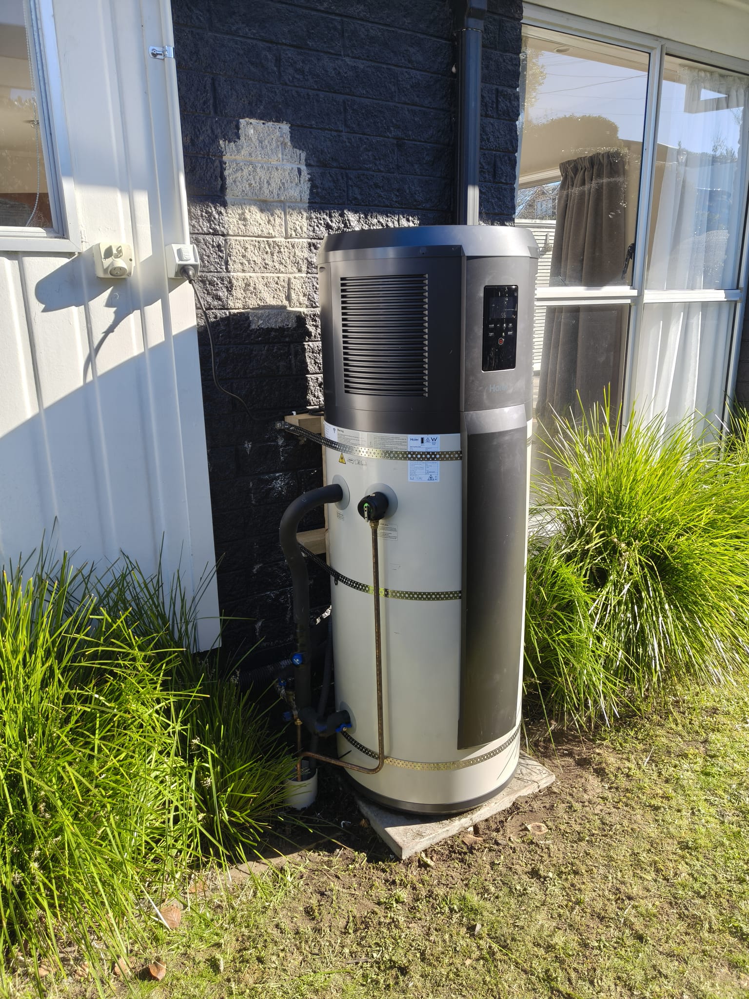 Haier monoblock hot water heat pump installed on a New Zealand home